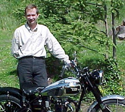 Smiling Man With His Golden Flash Bike